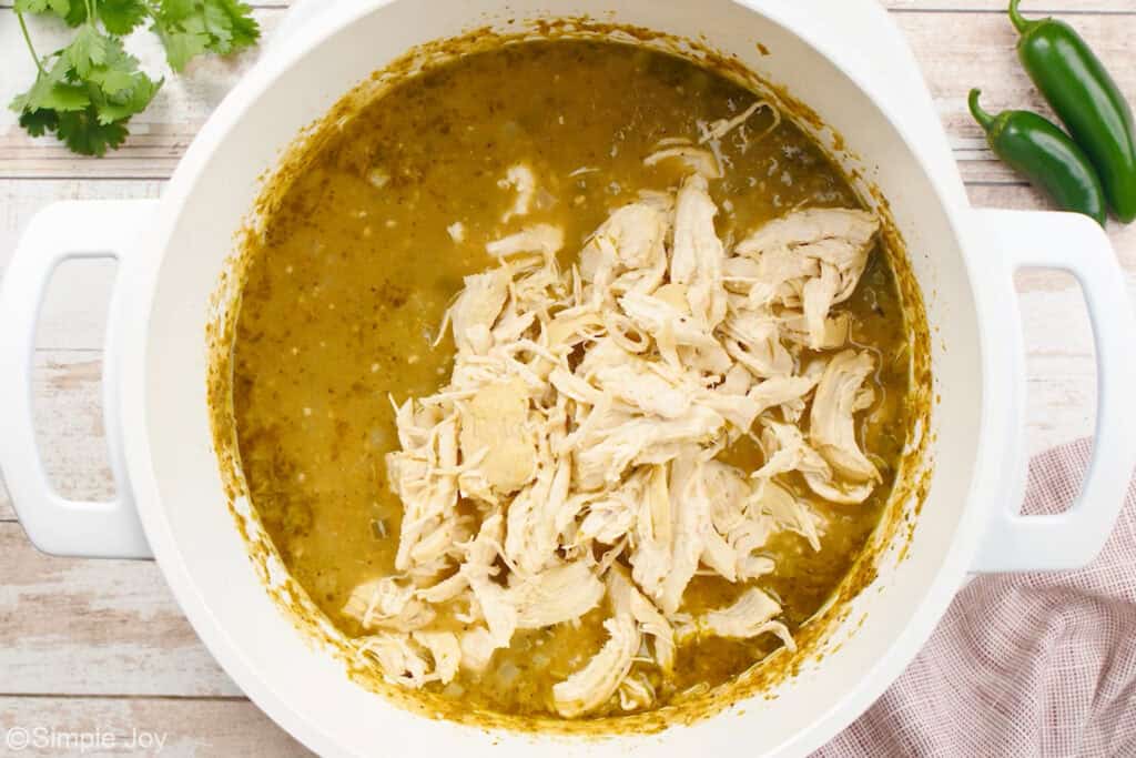 Overhead of large pot of white chicken chili ingredients