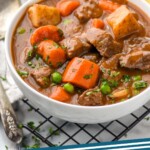 Pinterest graphic for Beef Stew recipe. Image shows two bowls of Beef Stew. Text says, "the best Beef Stew simplejoy.com"
