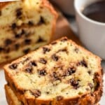 Pinterest graphic for Chocolate Chip Bread recipe. Text says, "the best Chocolate Chip Bread simplejoy.com." Image shows a stack of slices of Chocolate Chip Bread with loaf of bread and cup of coffee beside.
