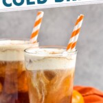 Pinterest graphic for Pumpkin Cream Cold Brew recipe. Text says, "copy cat Pumpkin Cream Cold Brew simplejoy.com." Image is side view of two glasses of Pumpkin Cream Cold Brew.