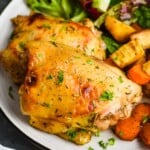 Photo of Baked Chicken Thighs served on a plate with veggies and side salad - 21