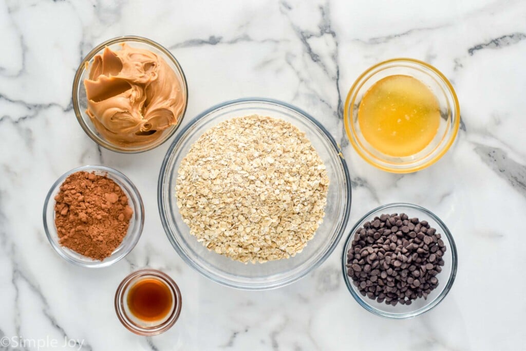 Overhead photo of bowls of ingredients for Chocolate No Bake Energy Bites recipe