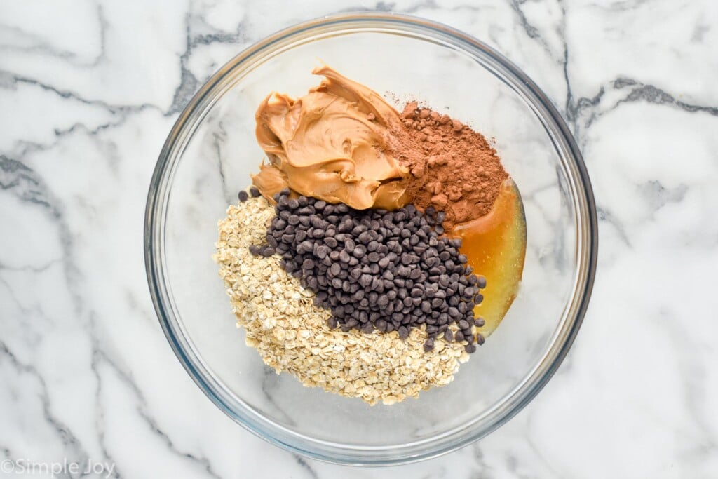 Overhead photo of a mixing bowl of ingredients for Chocolate No Bake Energy Bites recipe