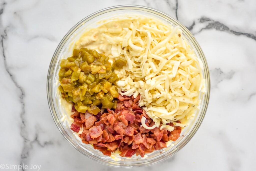 overhead view of bowl of corn dip ingredients