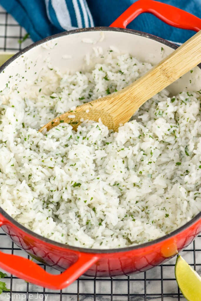 Photo of a pot of Cilantro Lime Rice with a spoon