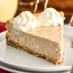 Slice of Eggnog Cheesecake served on a plate