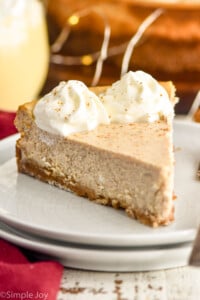 Slice of Eggnog Cheesecake served on a plate