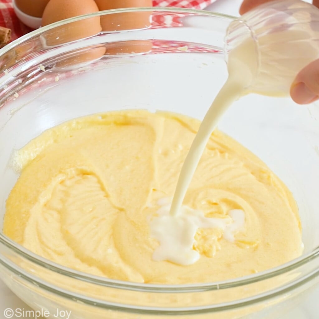 adding milk to batter