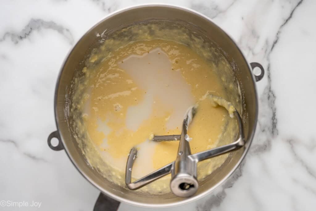 adding milk to wet ingredients for coffee cake muffins batter