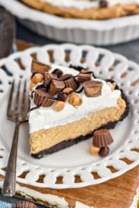 Slice of Peanut Butter Pie on a plate with a fork