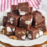 Photo of stack of Rocky Road Fudge pieces served on a platter.