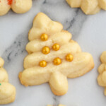 Close up overhead photo of Spritz Cookies decorated with sprinkles