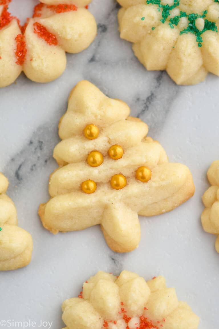 Close up overhead photo of Spritz Cookies decorated with sprinkles