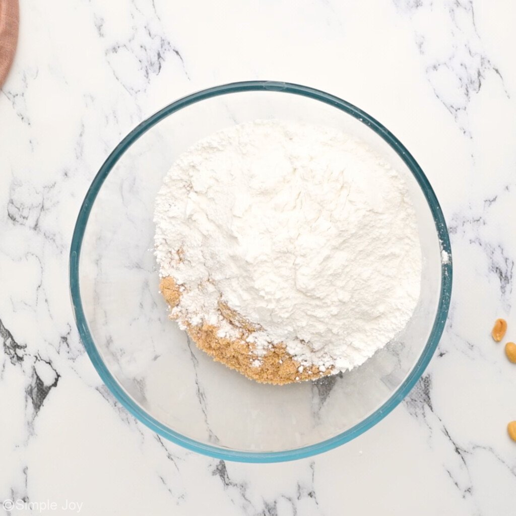 bowl with graham cracker crumbs and powdered sugar