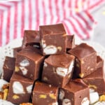 pinterest graphic of plate with rocky road fudge, says: "delicious rocky road fudge simplejoy.com"