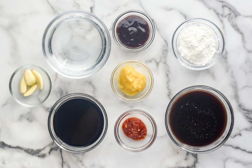 Overhead photo of Stir Fry Sauce ingredients in clear bowls.