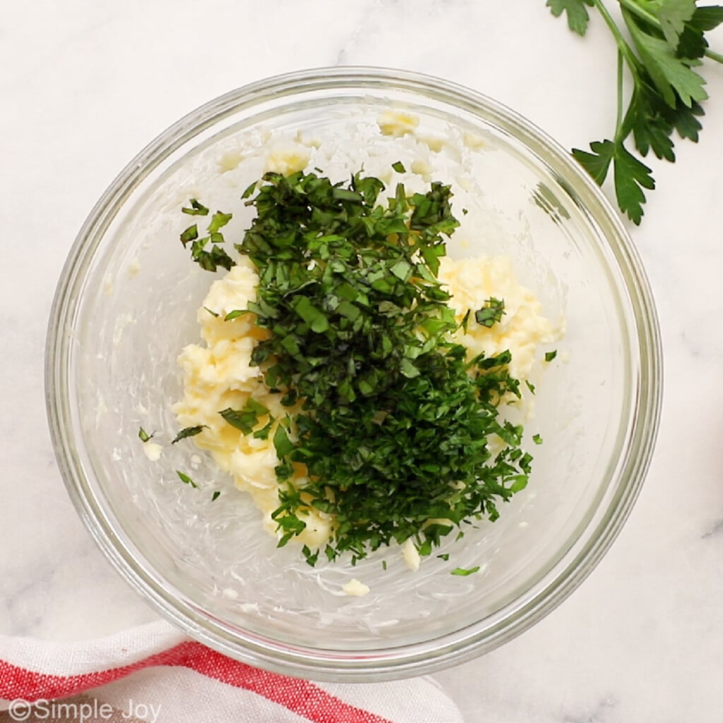 Overhead view of ingredients for garlic butter to garnish beef tenderloin.