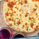 Pinterest graphic of overhead of a white pizza, says "white pizza simplejoy.com"