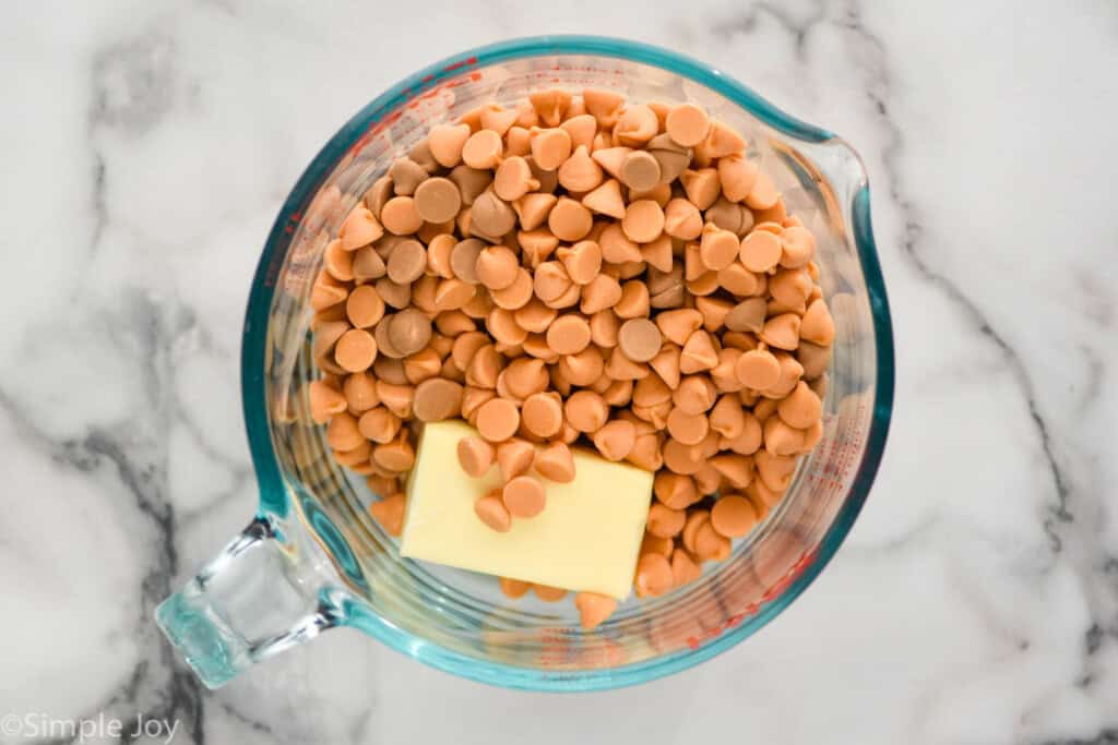 Overhead photo of a measuring cup of ingredients for Butterscotch Muddy Buddies recipe