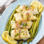 plate of cod, asparagus, and lemon slices made with Air Fryer Cod recipe