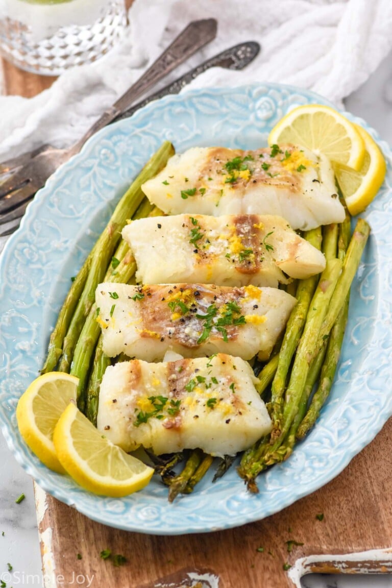 plate of cod, asparagus, and lemon slices made with Air Fryer Cod recipe
