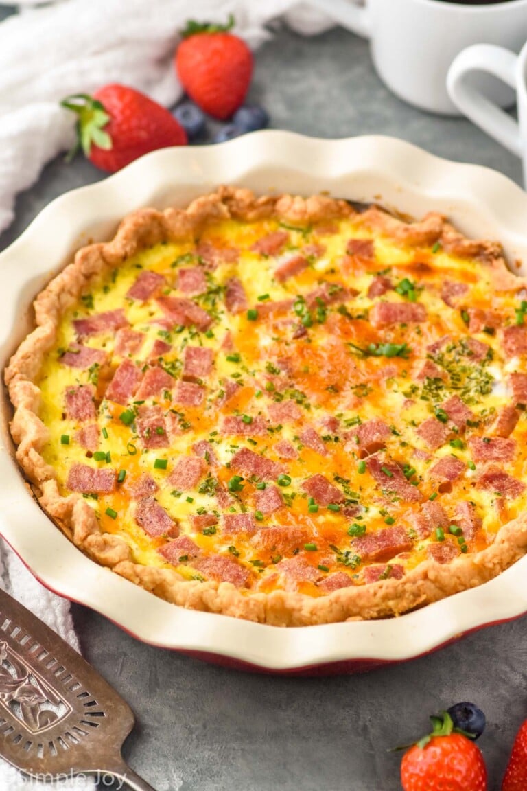 Ham and Cheese Quiche with fruit beside