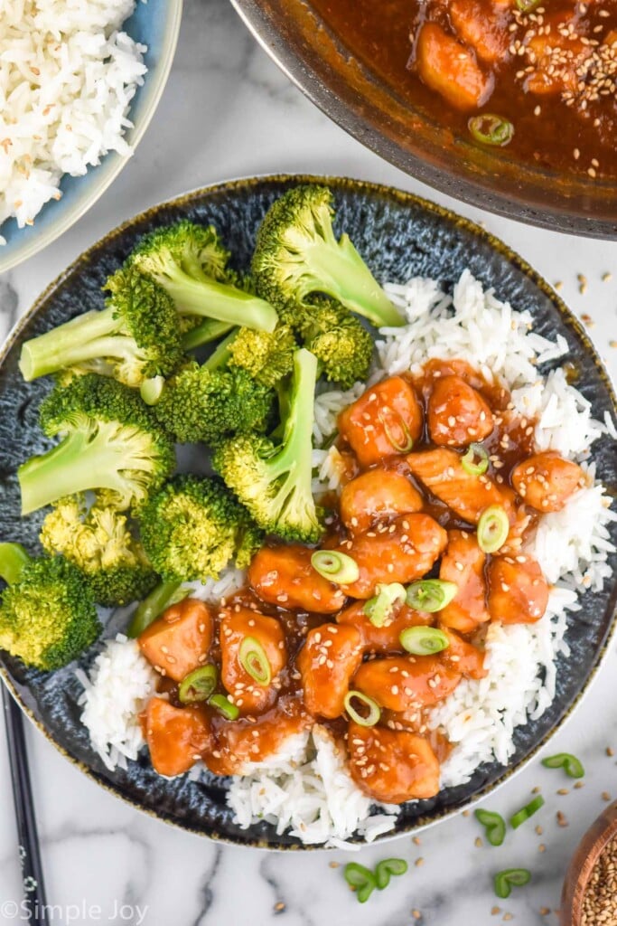Overhead view of Sesame Chicken with rice and broccoli