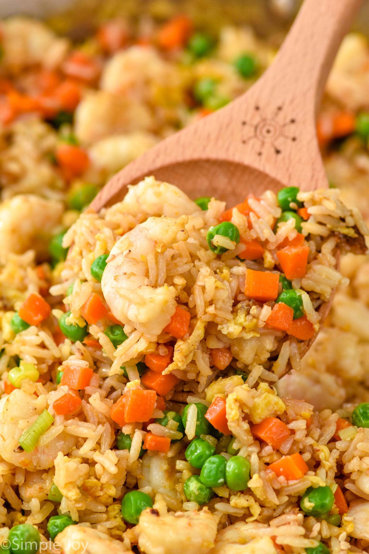 Close up photo of Shrimp Fried Rice with a spoon