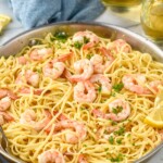 Skillet of Shrimp Linguine with glasses of wine beside - 8