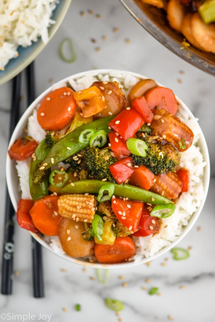 Overhead view of Vegetable Stir Fry in a bowl with rice