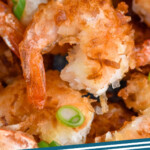 Pinterest graphic for Coconut Shrimp recipe. Image is close up photo of Coconut Shrimp. Text says, "Coconut Shrimp simplejoy.com"
