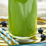 Pinterest graphic for Green Smoothie recipe. Image shows a Green Smoothie with blueberries. Text says, "Green Smoothie simplejoy.com"