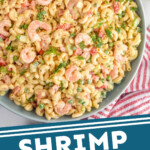 Pinterest graphic for Shrimp Pasta Salad recipe. Image shows a large bowl of Shrimp Pasta Salad. Text says, "Shrimp Pasta Salad simplejoy.com"