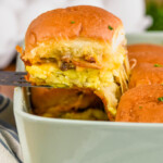 Side view of spatula lifting Breakfast Slider out of baking dish - 19