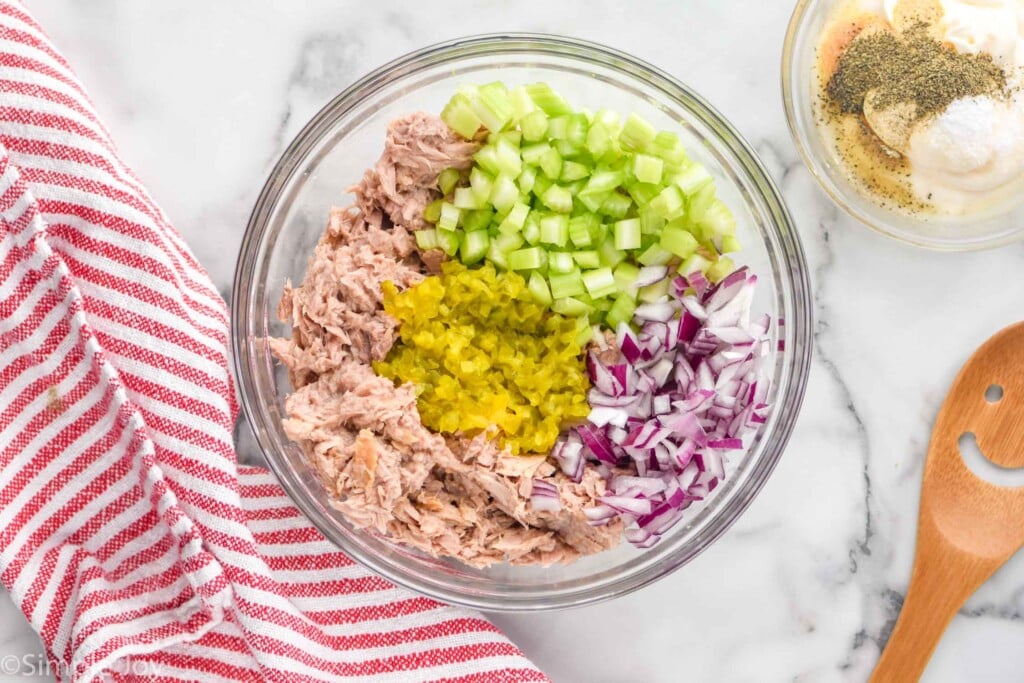 Overhead view of a bowl of ingredients for Tuna Salad recipe