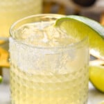 Margarita garnished with lime wedge and salted rim