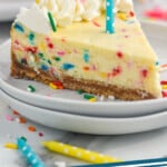 Pinterest graphic for Birthday Cheesecake recipe. Image shows slice of Birthday Cheesecake with a candle. Text says, "Birthday Cheesecake simplejoy.com"