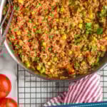 Pinterest graphic for Ground Beef and Rice recipe. Image is overhead view of Ground Beef and Rice. Text says, "one pot delicious Ground Beef and Rice simplejoy.com"