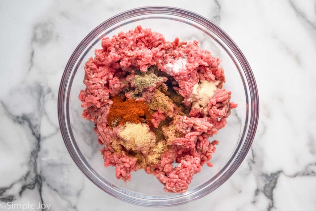 Overhead view of bowl of ingredients for Air Fryer Burgers recipe