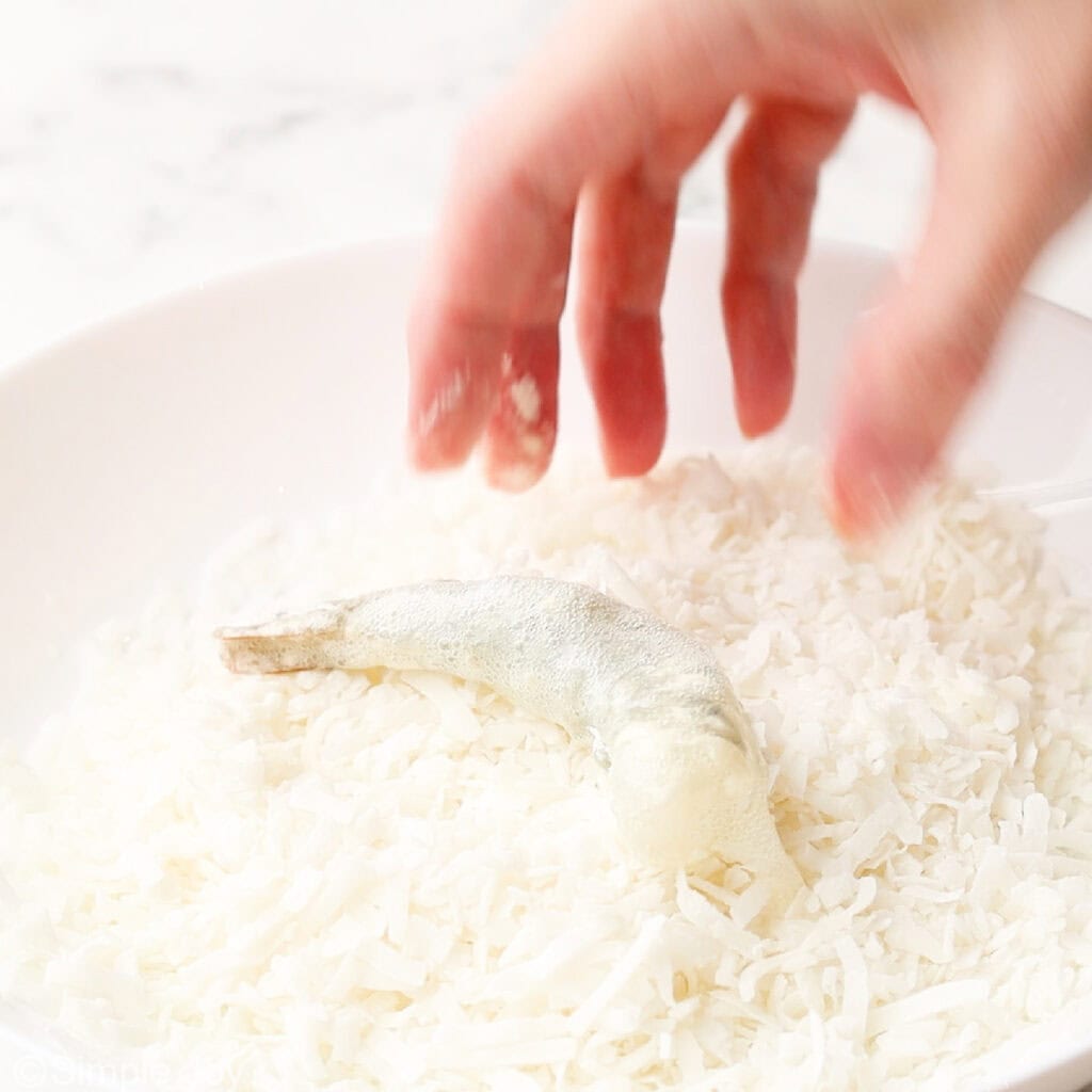 coating shrimp in coconut flakes