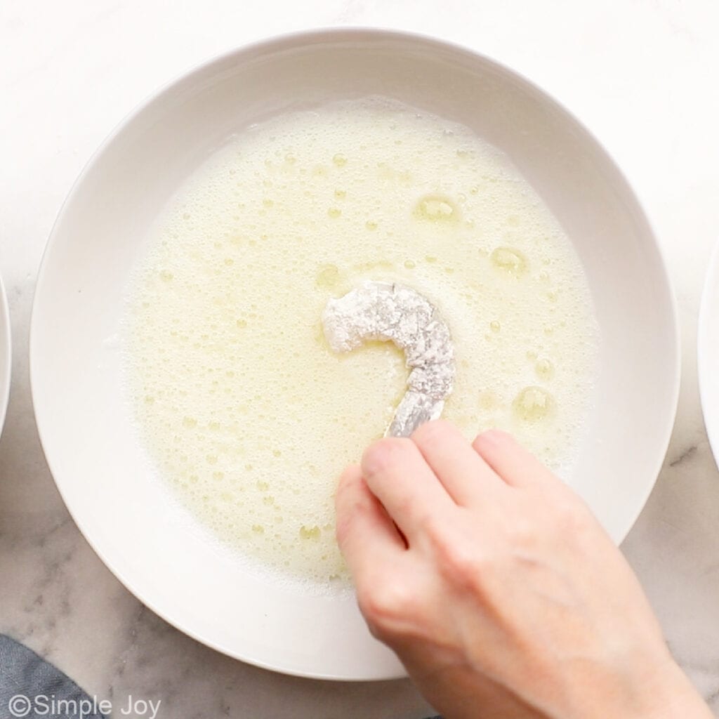 breading shrimp in an egg white bath