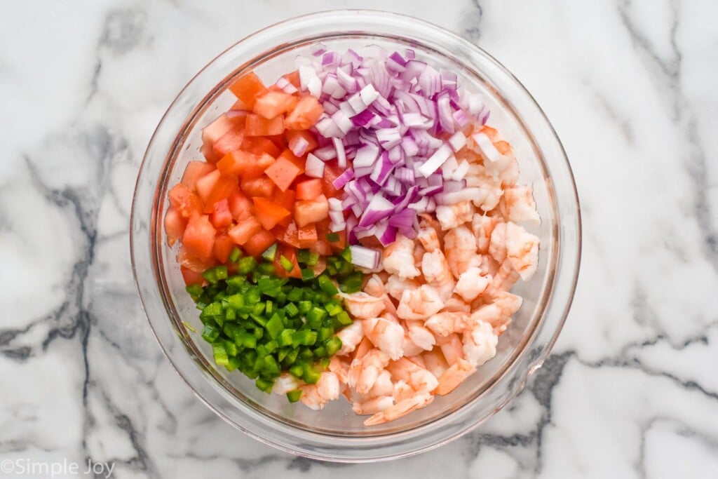 overhead of bowl of Shrimp Avocado Salad ingredients