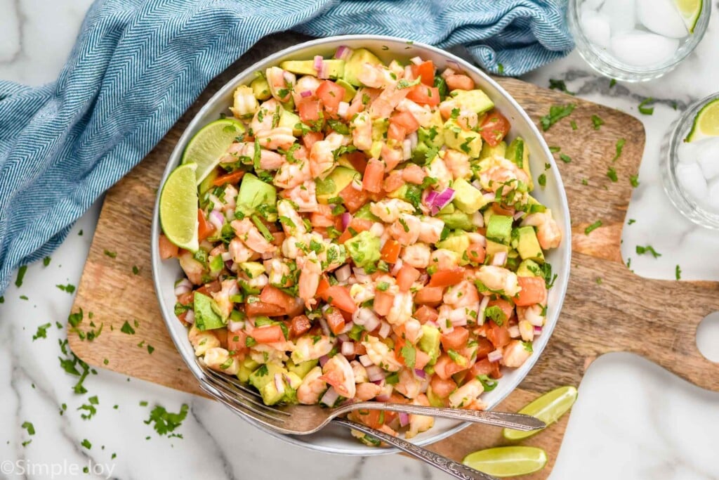 overhead of bowl of Shrimp Avocado Salad with a fork