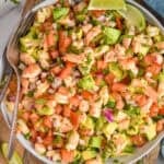 overhead of bowl of Shrimp Avocado Salad with a fork