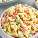bowl of Macaroni Salad with fork sitting in front - 11