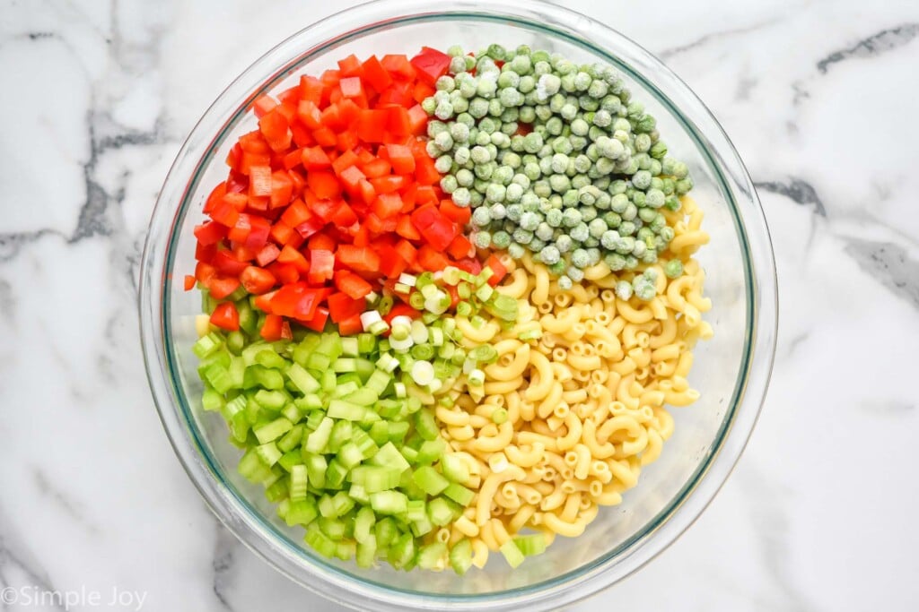 overhead of bowl of Macaroni Salad ingredients