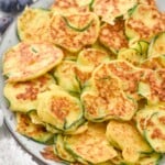 plate of Italian Zucchini Fritters with fresh strawberries and blueberries in background - 17