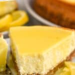 pinterest graphic of a piece of lemon cheesecake on a plate with a bite missing, says: the best lemon cheesecake