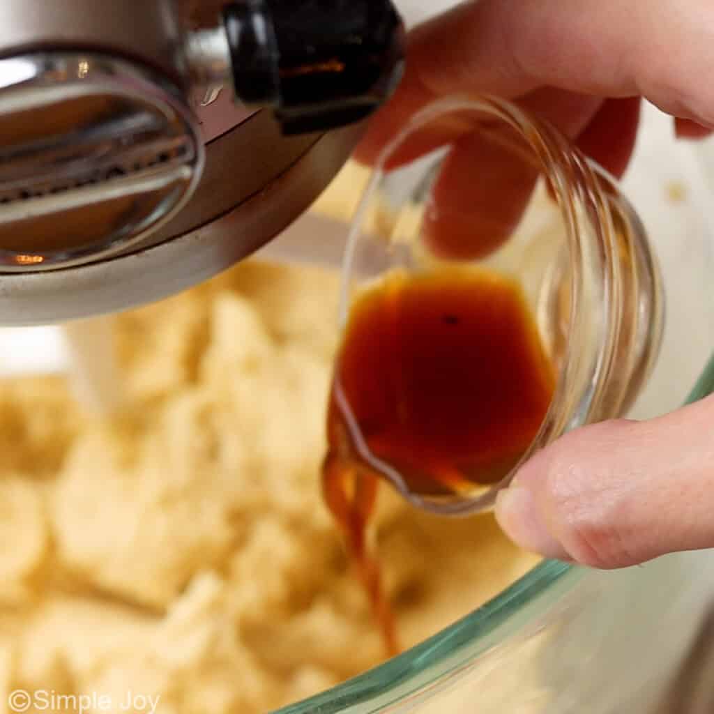 adding vanilla to chocolate chip cookie batter