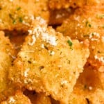 close up of Fried Ravioli topped with grated parmesan cheese - 11